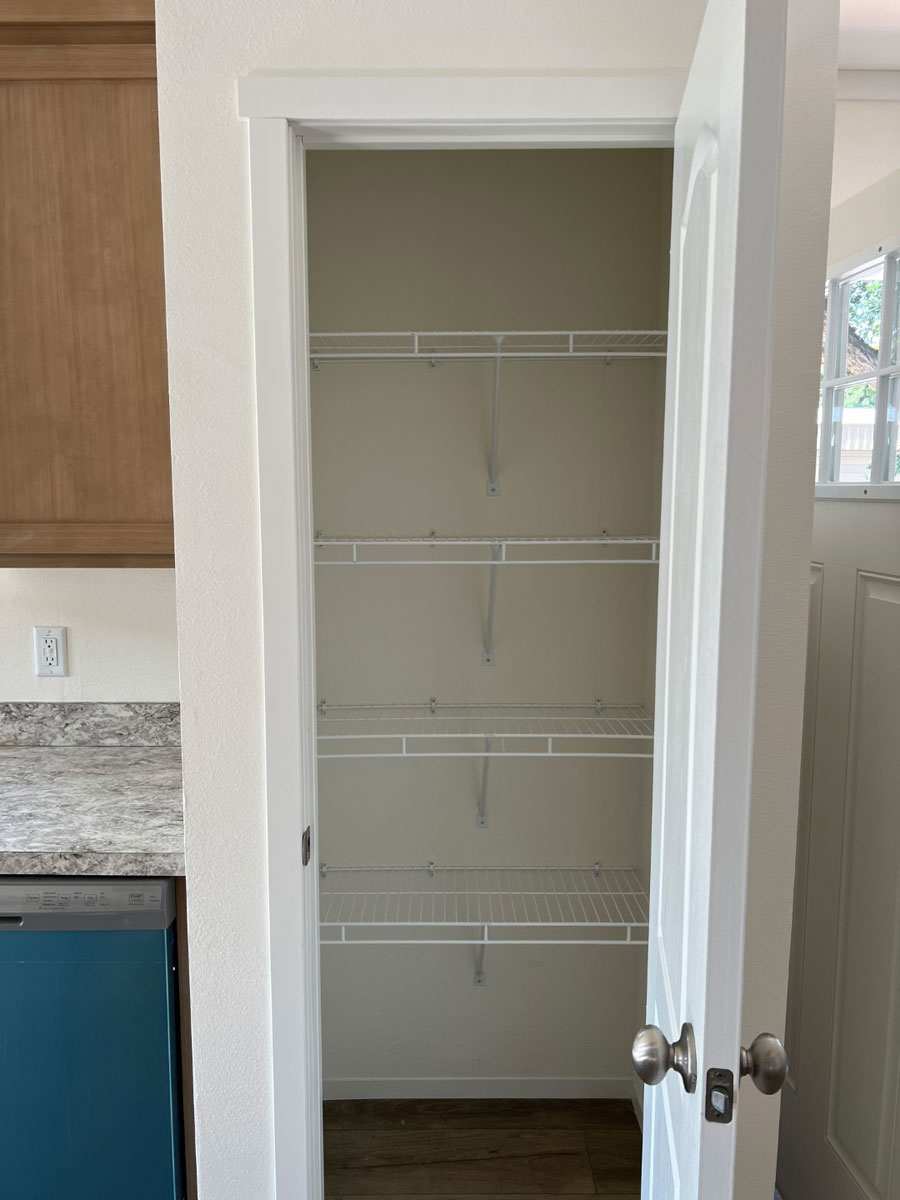 Spacious pantry in the Here Comes the Sun 51TEM24483AH kitchen