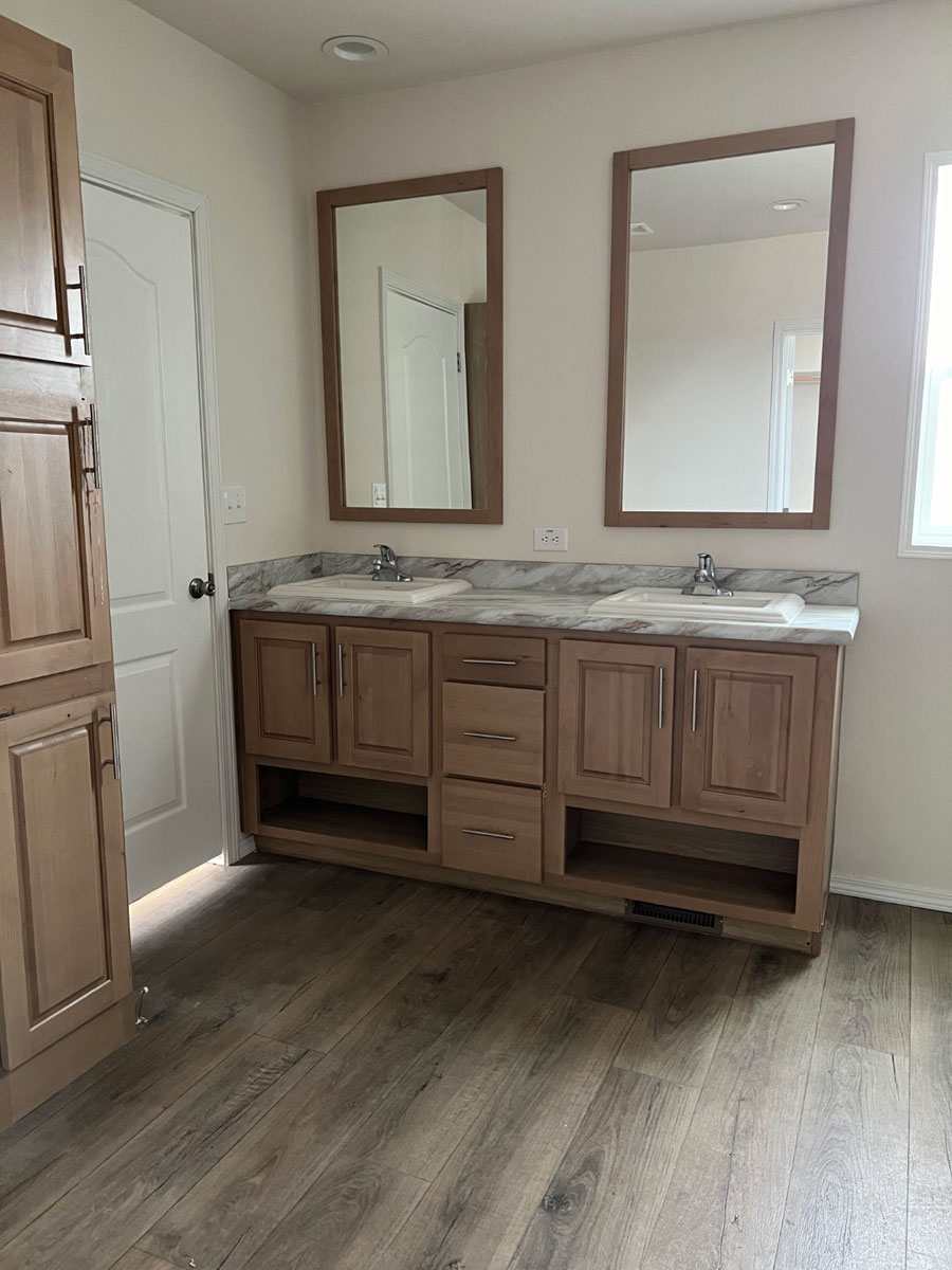 Double vanity with ample storage in the 3-bedroom Fleetwood Bruneau