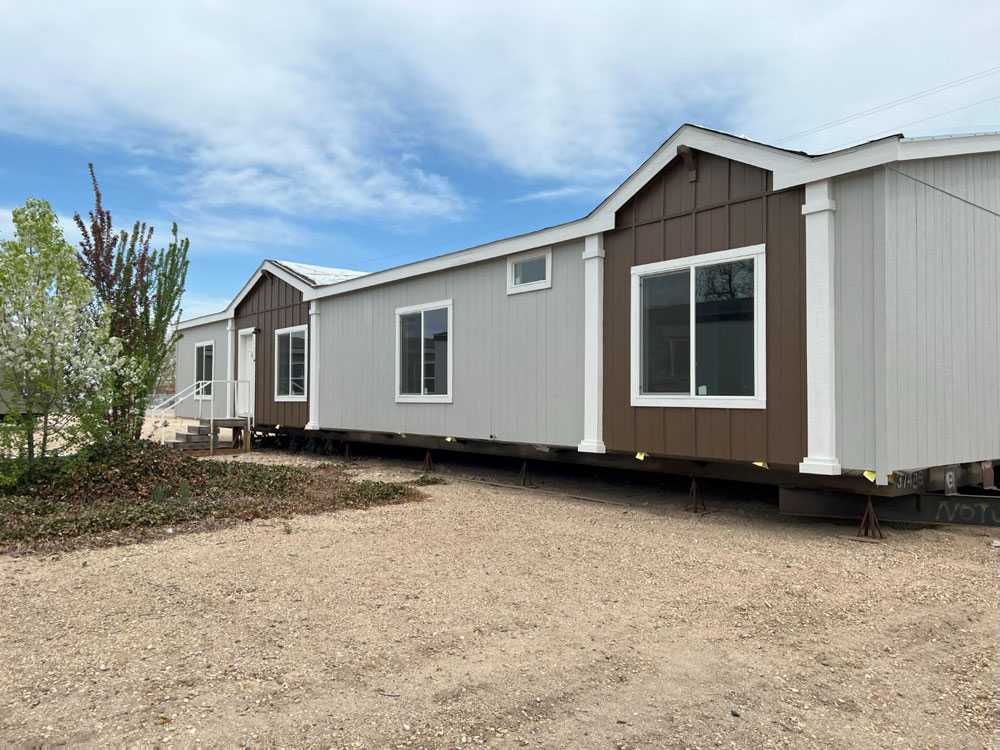 Trendy exterior with multiple dormers on the Fleetwood Bruneau
