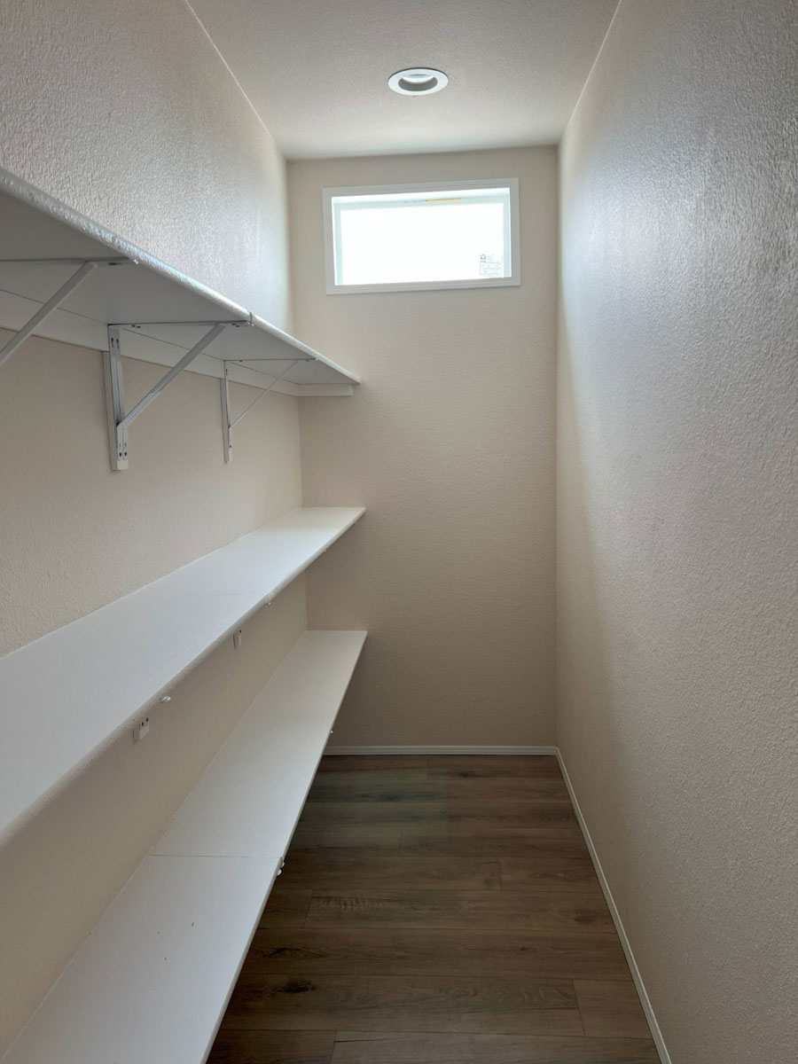 Spacious pantry with natural light in the Fleetwood Bruneau home