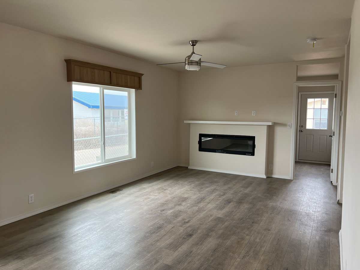 Cozy family room off the dining with a built in fireplace on the 28683N