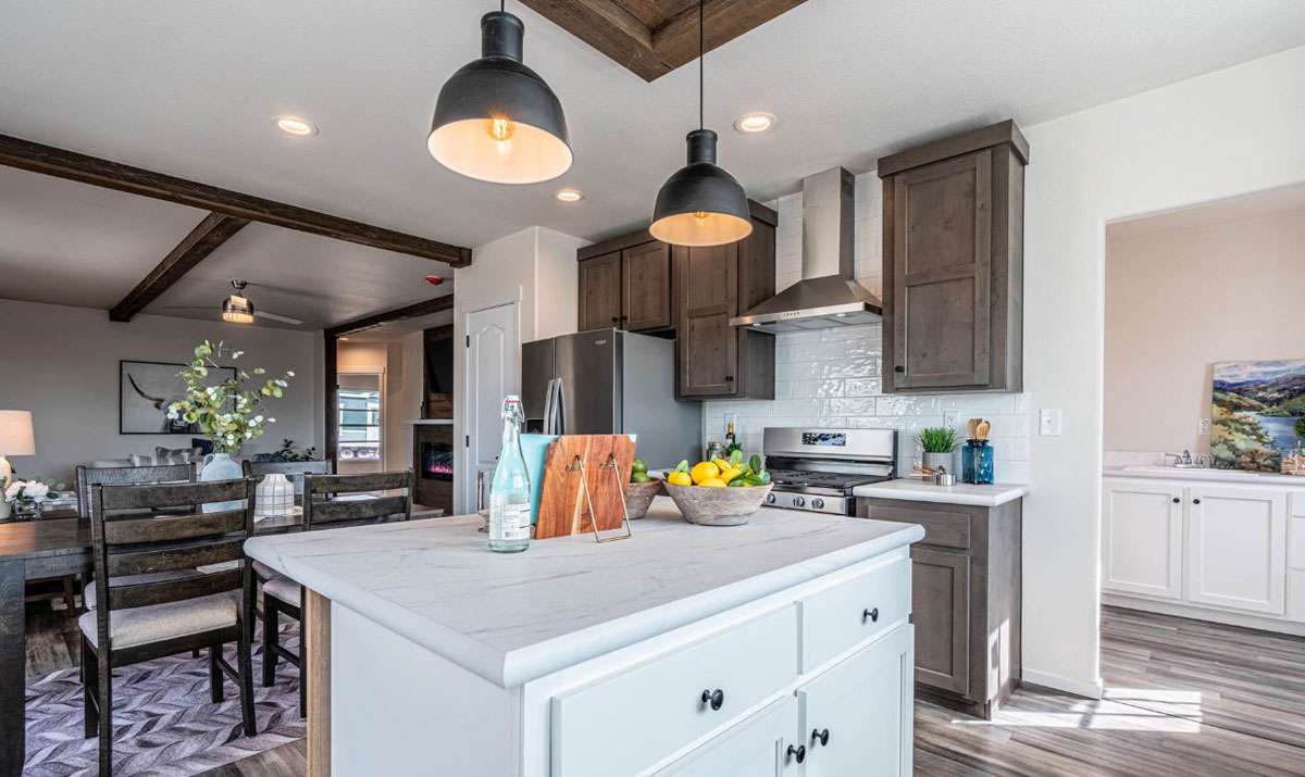 The Opal kitchen features stainless steel appliances and charming lights