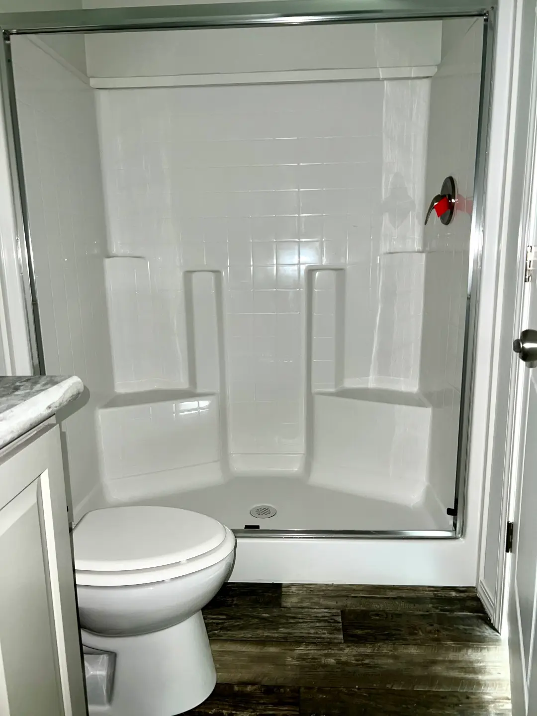 Large walk in shower in this Champion Home