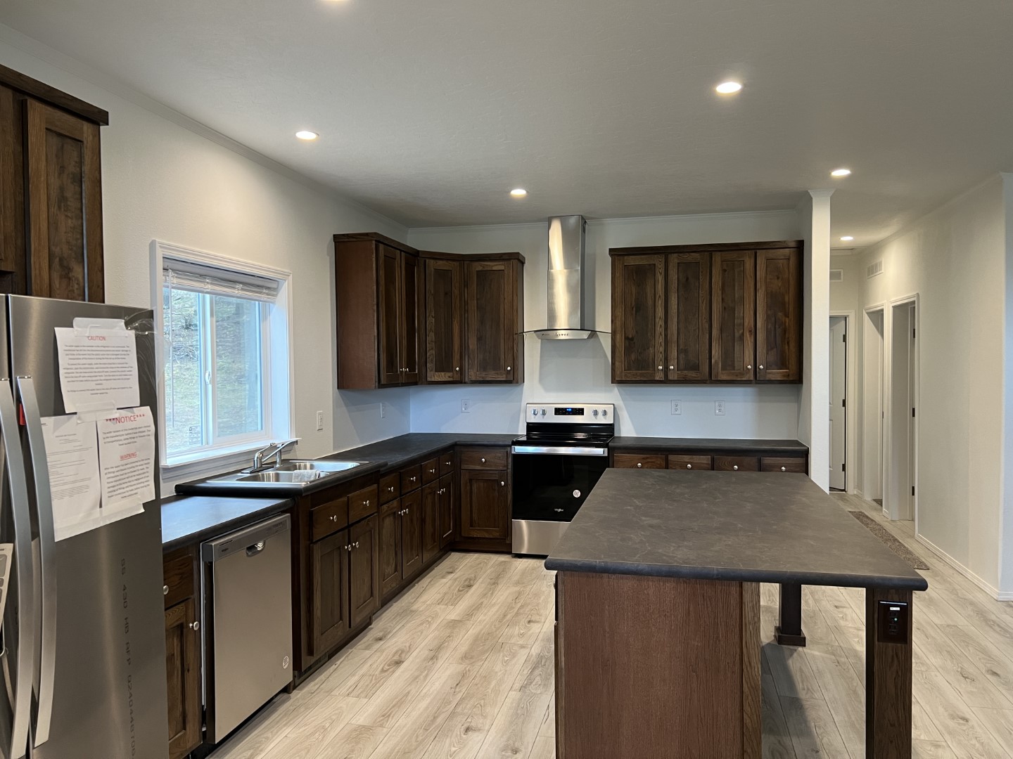 Large refrigerator and hardwood cabinets in the Champion CB4442C