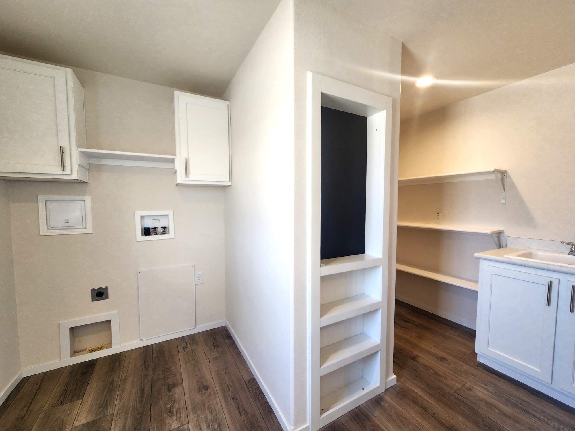 Large utility, laundry, and pantry space in this Broadmore 28683B