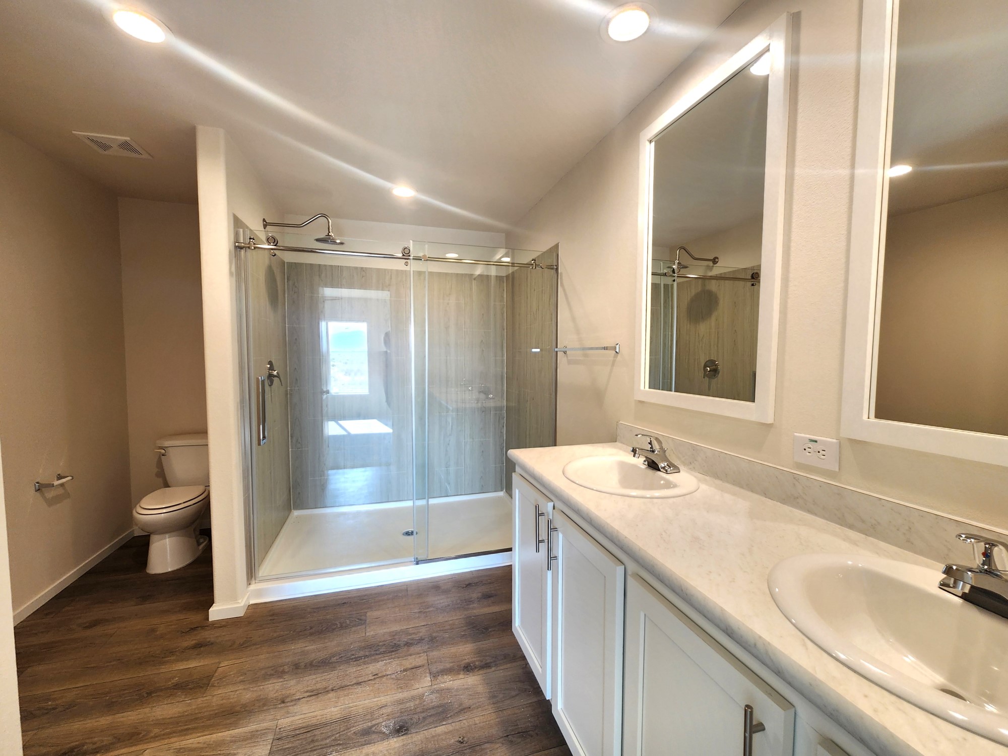 Gorgeous spa-like bathroom in the Cavco Broadmore 28683B home