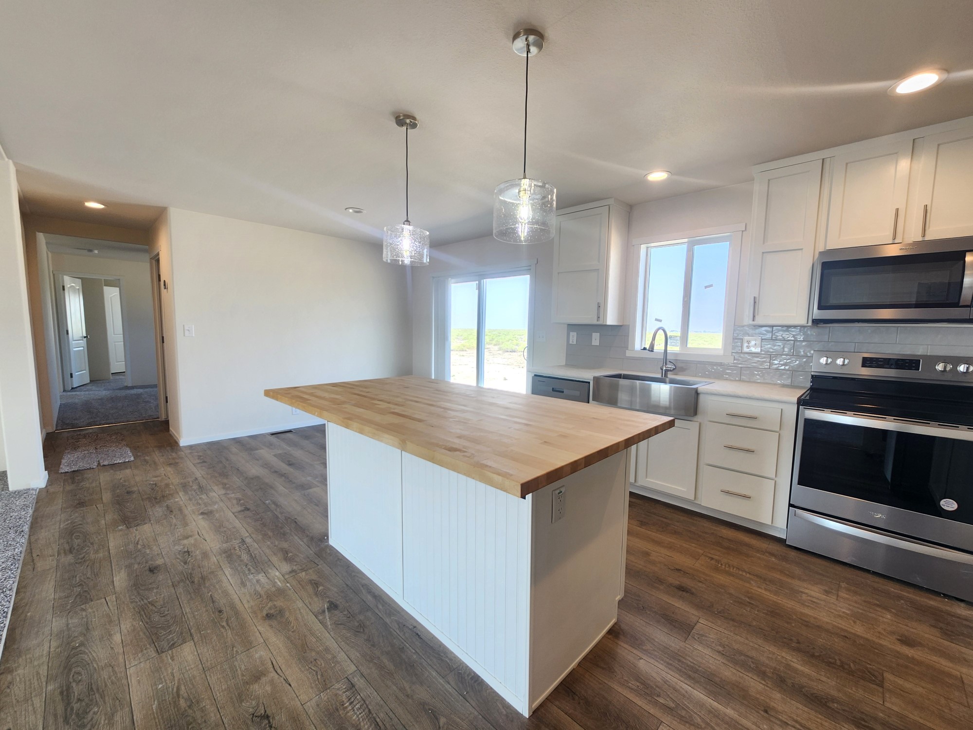 Large kitchen with solid butcher block countertops in the 28683B